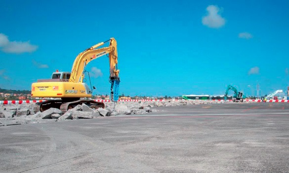 Demolishing the apron concrete slabs