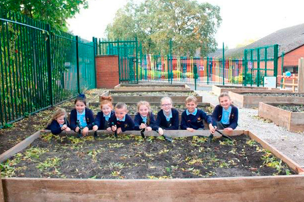 The Mersey team in the UK converts a plot of land into a garden for the students of a primary school in Halton